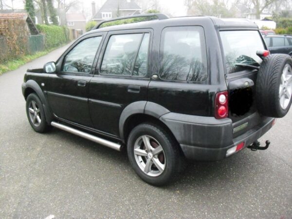 freelander 1 L314 1800cc handgeschakeld met zwarte leren stoelen met Alcantara , stationwagon kleur zwart Java Black ( 697 ) bouwjaar 2003