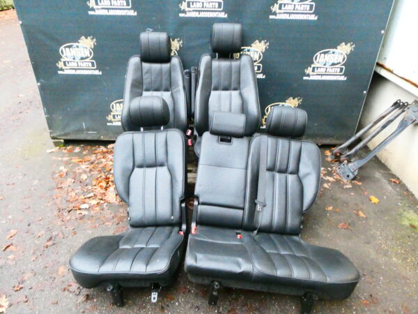 Range Rover L322 set stoelen voor+achter zwart leer met displayscherm in hoofdsteunen