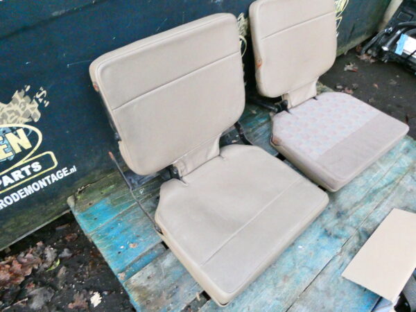 Discovery 1 set 6e/7e stoel compleet met frames en gordels beige leer
